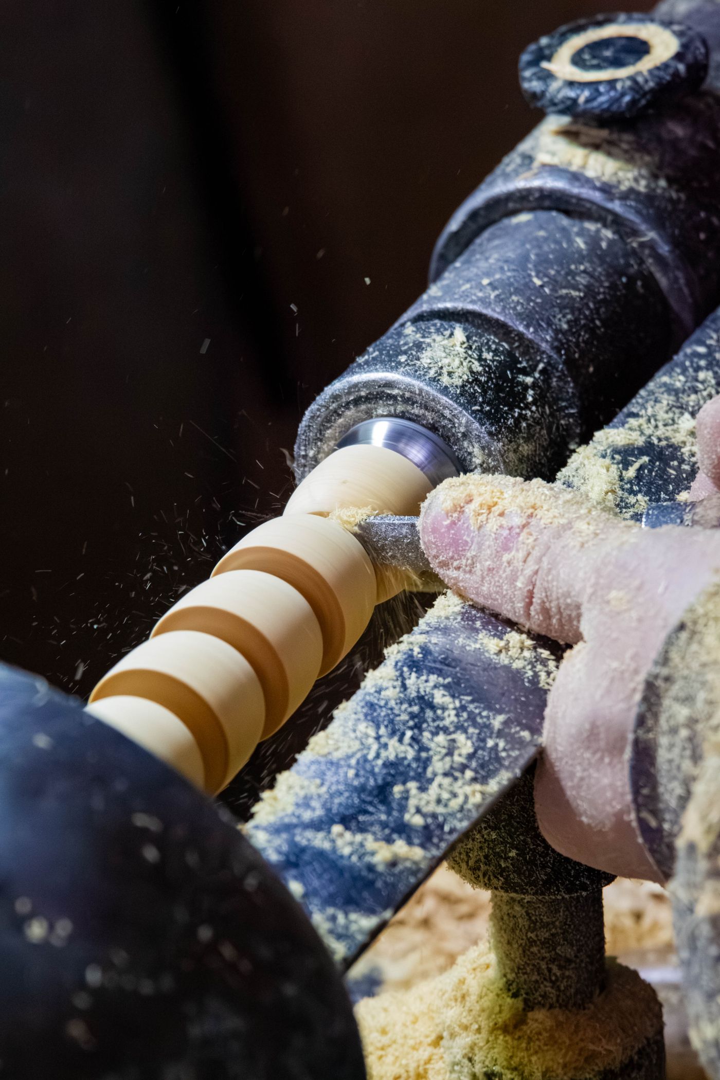 Woodturner at work in a traditional artisan workshop in Fes, Morocco