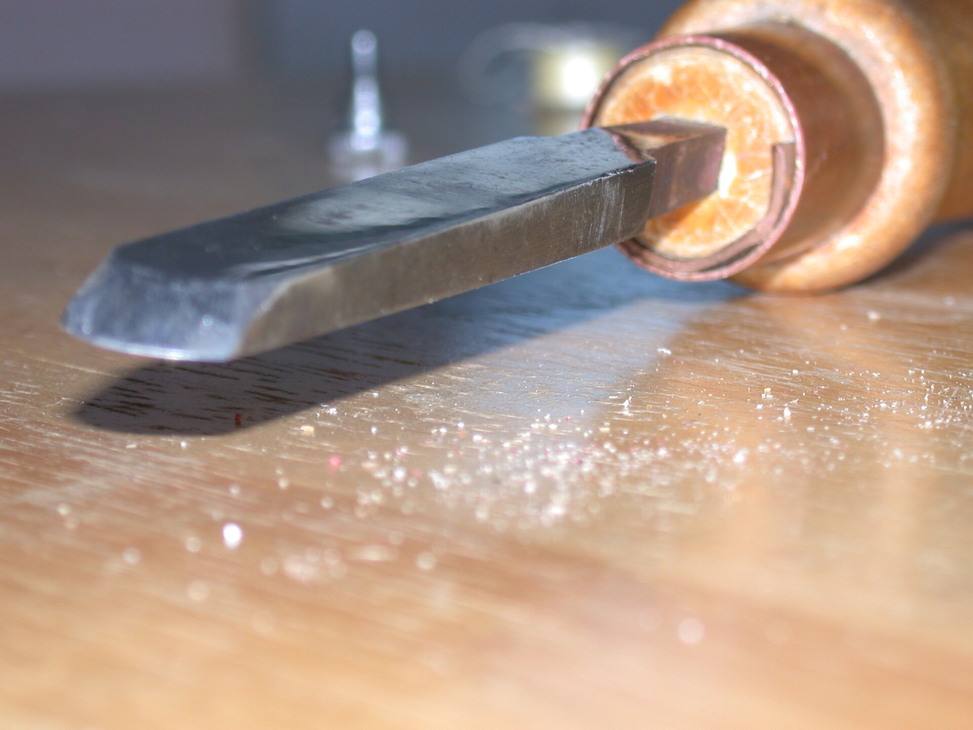 A skew chisel, a core spindle-turning tool